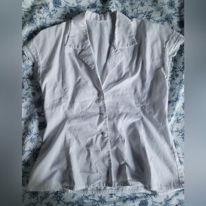 Hand-made, vintage, adorable short sleved button-up blouse.